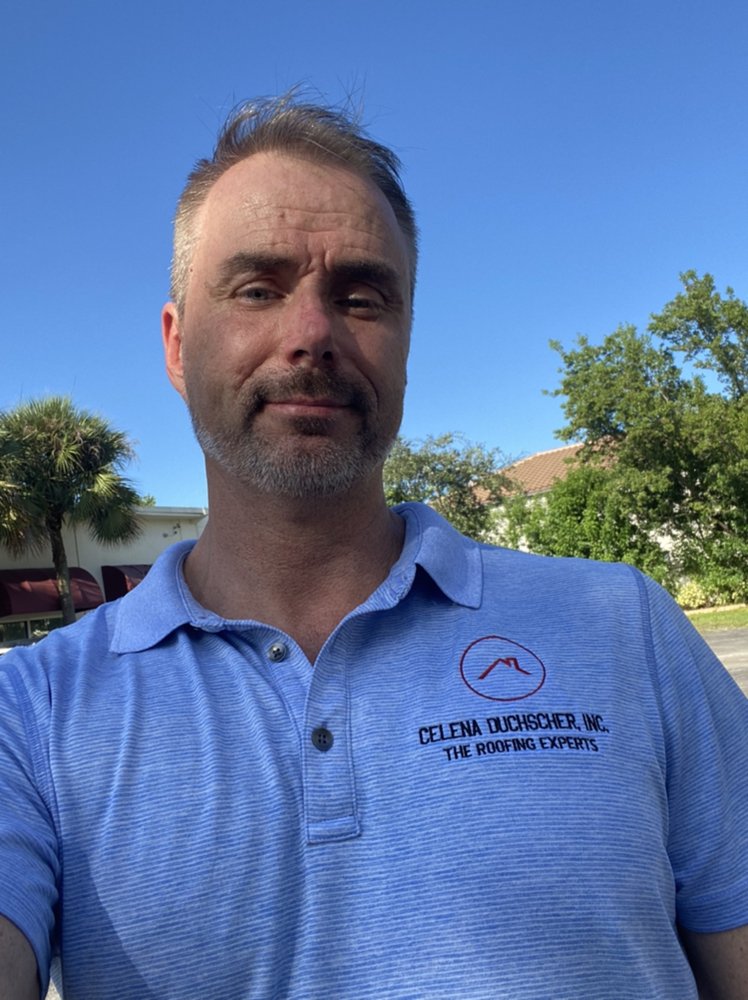 Slide of The Roofing Experts