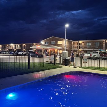 Kansas Country Inn - Pool and motel at night - Hotels Near Me - Oakley, Kansas Kansas Country Inn - Pool and motel at night - Hotels Near Me - Oakley, Kansas
