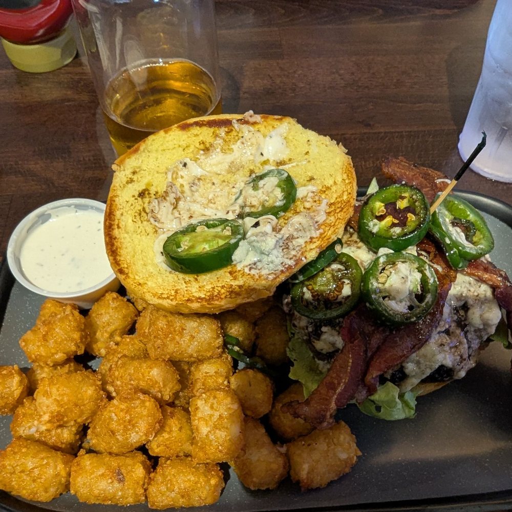 Gray's Tavern - Bacon bleu cheese burger with jalapenos and tots - Sports Bars Near Me - Turlock, California Gray's Tavern - Bacon bleu cheese burger with jalapenos and tots - Sports Bars Near Me - Turlock, California