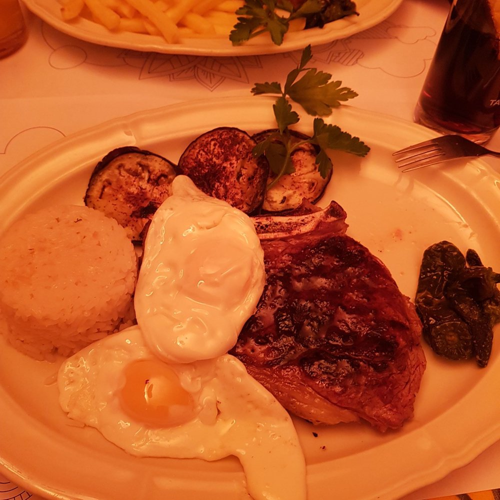 El Chiringuito - My fries were in a little basket, couldn't get them in the picture. 400gr beef steak with vegetables, rice and eggs - Spanish Near Me - Lausanne, VD El Chiringuito - My fries were in a little basket, couldn't get them in the picture. 400gr beef steak with vegetables, rice and eggs - Spanish Near Me - Lausanne, VD