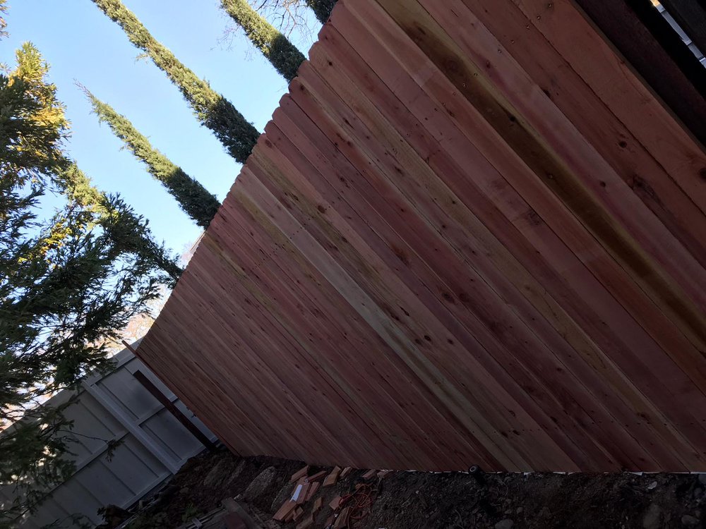 Slide of Reynoso Roofing and Fencing