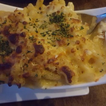Deep Blu Seafood Grille - A bit over baked but delicious underneath...you're looking at the Blu Crab Mac N' Cheese side dish - Seafood Near Me - Orlando, Florida Deep Blu Seafood Grille - A bit over baked but delicious underneath...you're looking at the Blu Crab Mac N' Cheese side dish - Seafood Near Me - Orlando, Florida