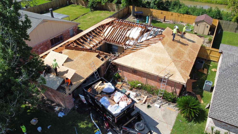 Slide of Space City Roofing & Remodeling