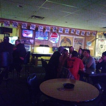 Moods - a group of people sitting at tables in a restaurant - Bars Near Me - Portage, Indiana