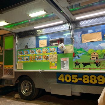 Taqueria Mr Dollar - a man standing in front of a food truck - Food Trucks Near Me - Oklahoma City, Oklahoma