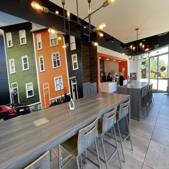 Mary Brown's - a restaurant with a long table and chairs - Chicken Shop Near Me - Surrey, British Columbia Mary Brown's - a restaurant with a long table and chairs - Chicken Shop Near Me - Surrey, British Columbia