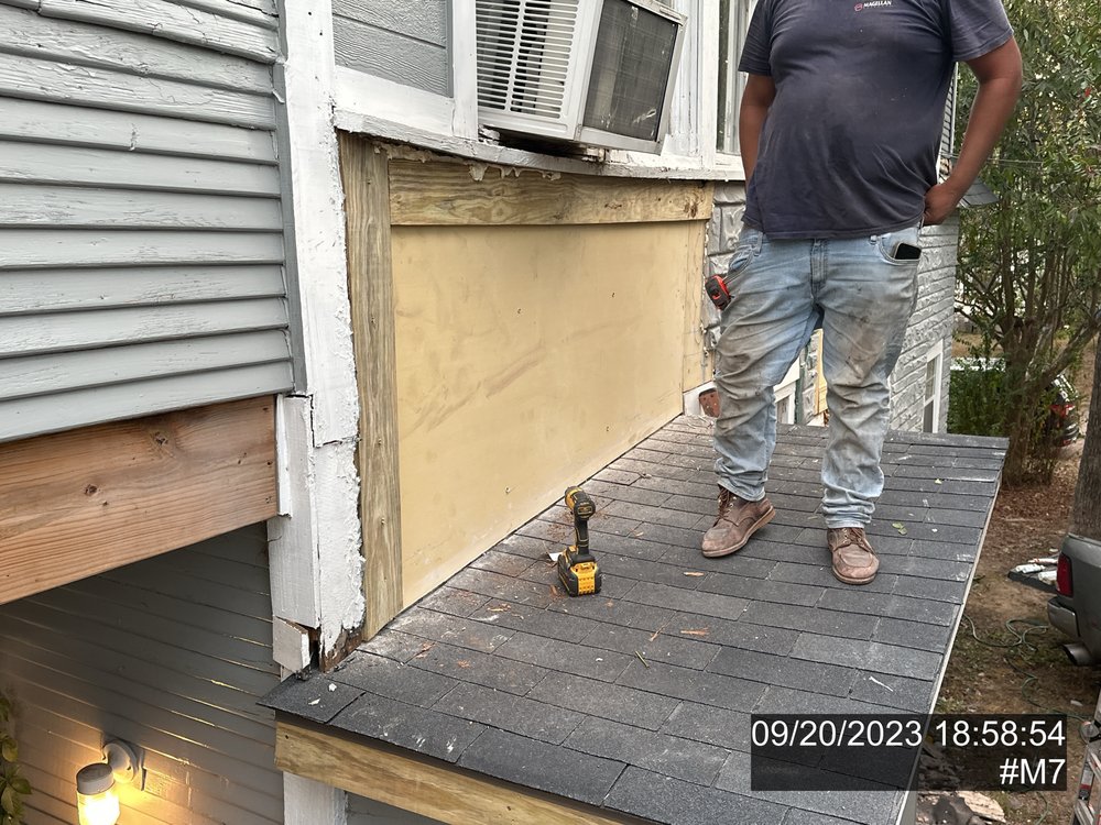 Slide of Busse Roofing