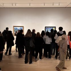 The Museum of Modern Art - Groupies in font of Van Gogh's Starry Night