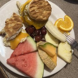 JavaPrimo Coffee House Cafe & More - Breakfast biscuit sandwiches and fresh fruit.