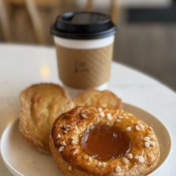 Left Bank Pastry - Apricot croissant and palmier - Bakeries Near Me - Olympia, Washington Left Bank Pastry - Apricot croissant and palmier - Bakeries Near Me - Olympia, Washington