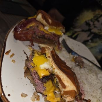 Tavern In The Bluffs - Bacon cheeseburger with cilantro lime rice. - Sports Bars Near Me - Belleair Bluffs, Florida Tavern In The Bluffs - Bacon cheeseburger with cilantro lime rice. - Sports Bars Near Me - Belleair Bluffs, Florida