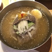 Photo of Mo Ran Gak Restaurant - Garden Grove, CA, United States. Cold chewy noodles in chilled broth