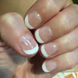 He only cleaned up the line on the first of three coats, so the white tips came out bumpy and irregular. $30.