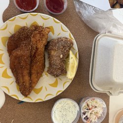 SeaLand Fish & Chips - Cat fish (big piece) halibut (smaller piece). Large cups of tartar sauce comes with your order!