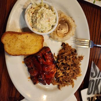 Smokey Bones Rockford - a plate of barbecue food - American Near Me - Rockford, Illinois Smokey Bones Rockford - a plate of barbecue food - American Near Me - Rockford, Illinois