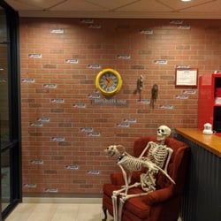 Escape Expert - Our Mascot Lochsmith and his faithful dog Paddy sitting comfortably in their new space