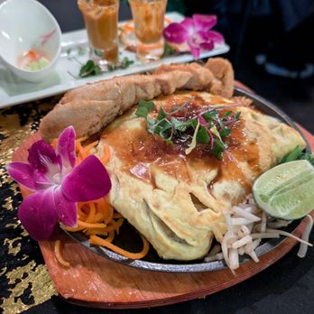 Madame Puffs and Thai Bistro - This was the pad thai. It was amazing how it was served - Thai Near Me - Chicago, Illinois Madame Puffs and Thai Bistro - This was the pad thai. It was amazing how it was served - Thai Near Me - Chicago, Illinois