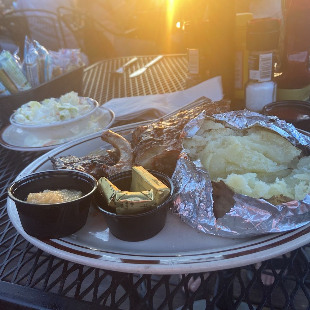 Mars Resort - 1/2 slab ribs, baked potato, applesauce and coleslaw. Beautiful sunset on the patio. - American Near Me - Lake Geneva, Wisconsin