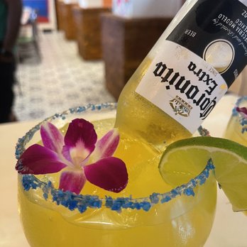 El Paso Tacos & Tequila - a bottle of tequila being poured into a margarita - Mexican Near Me - Navarre, Florida