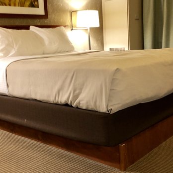 Fluno Center - Bed hanging off the edge of it's base.  It was like the base was made for a twin bed and the mattress was clearly not a twin mattress. - Venues & Event Spaces Near Me - Madison, Wisconsin