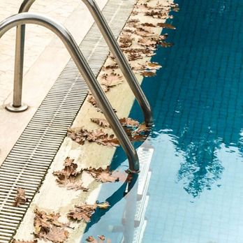 Absolute Pool and Spa Care - a pool with a metal handrail - Pool & Hot Tub Service Near Me - Cumming, Georgia Absolute Pool and Spa Care - a pool with a metal handrail - Pool & Hot Tub Service Near Me - Cumming, Georgia