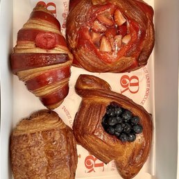 Pastries. Strawberry, Blueberry, Chocolate, and Raspberry Pastries. Strawberry, Blueberry, Chocolate, and Raspberry