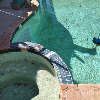 Legacy pools - Before pic, missing tiles and 20 years of staining. - Pool Cleaners Near Me