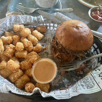 Happs Place - Smoked chopped brisket on Brioche hand held sandwich with tater tots. - American Near Me - Glenville, North Carolina