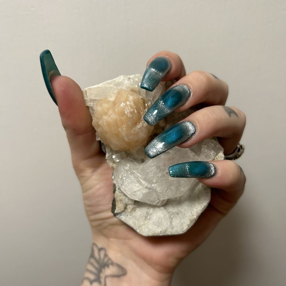 Cat eye design by Helen at Hollywood nails
