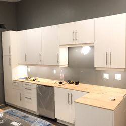 VAI Services - VAI Art Services Installing a custom designed IKEA kitchen for a condo remodel in Goleta