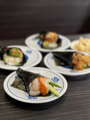 Kura Revolving Sushi Bar by null