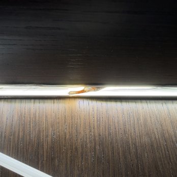 Bozem Electric - LED strip found sharply folded inside the lighting channel after the diffuser was removed. - Electricians Near Me Bozem Electric - LED strip found sharply folded inside the lighting channel after the diffuser was removed. - Electricians Near Me