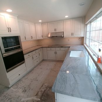 Action Restoration - New cabinets, and quartzite counters - General Contractors Near Me - Ontario, California