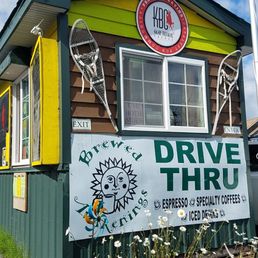a sign for a drive thru coffee shop