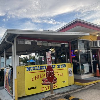 Mustard's Last Stand - They have outside seating and a few spots inside to sit - Hot Dogs Near Me - Melbourne, Florida Mustard's Last Stand - They have outside seating and a few spots inside to sit - Hot Dogs Near Me - Melbourne, Florida