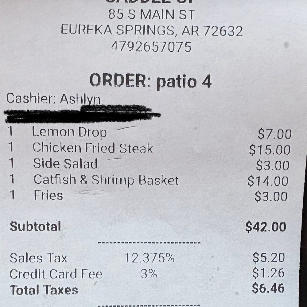 Receipt with extra added items we did not order. Receipt with extra added items we did not order.