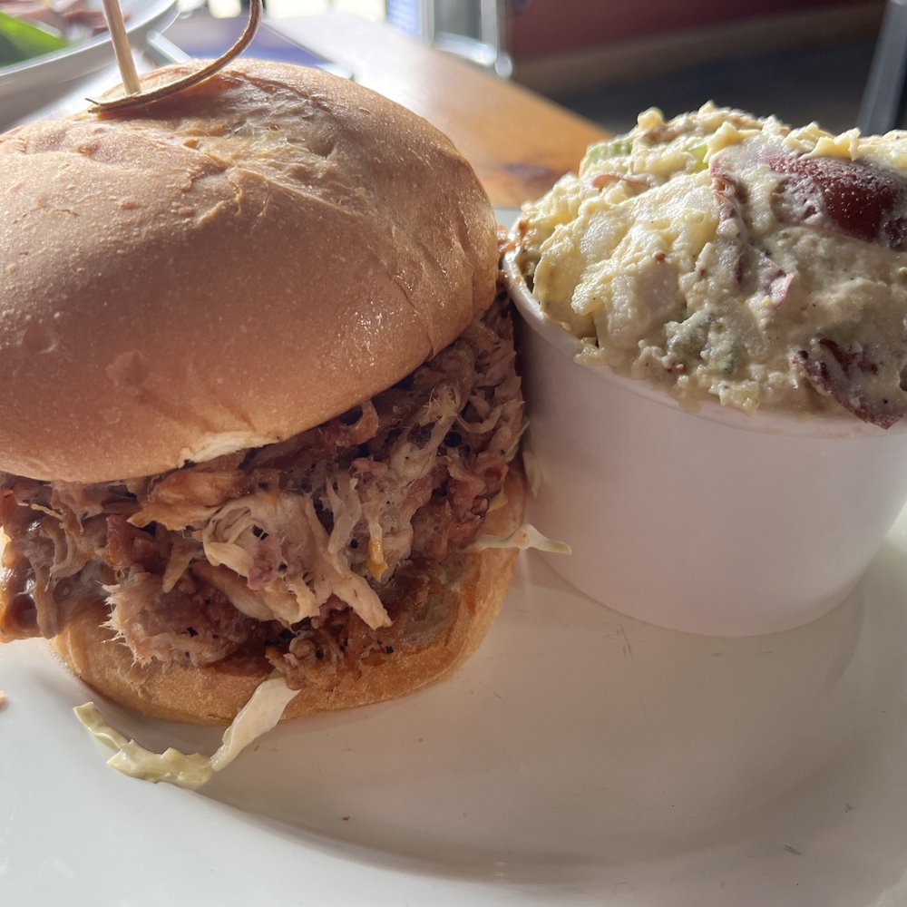 Palouse Caboose Bar And Grill - Pulled pork sandwich with potato salad - American Near Me - Palouse, Washington Palouse Caboose Bar And Grill - Pulled pork sandwich with potato salad - American Near Me - Palouse, Washington