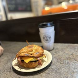 The Steam Engine - Croissant sandwich with egg, bacon and cheddar.