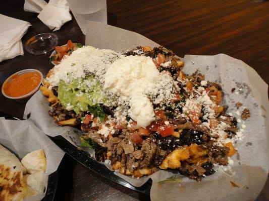 Photo of Taco Libre - San Francisco, CA, US. carne asada waffle fries!!