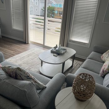 Mom's Ice Cream - a living room with sliding glass doors - Ice Cream & Frozen Yogurt Near Me - Kitty Hawk, North Carolina Mom's Ice Cream - a living room with sliding glass doors - Ice Cream & Frozen Yogurt Near Me - Kitty Hawk, North Carolina