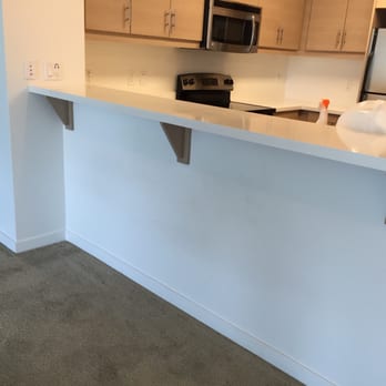 Connolly Station Apartments - Management office said this wall below the kitchen bar needs to be repainted and not returning my deposit - Apartments Near Me - Dublin, California Connolly Station Apartments - Management office said this wall below the kitchen bar needs to be repainted and not returning my deposit - Apartments Near Me - Dublin, California