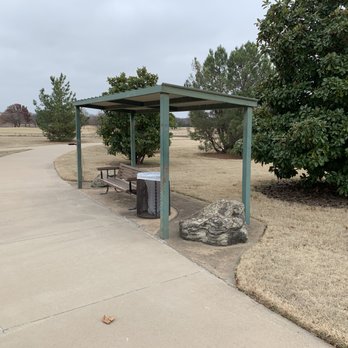 Hamilton Park - One of the many sitting areas with trash bins available on cement sidewalks. - Parks Near Me - Wichita Falls, Texas Hamilton Park - One of the many sitting areas with trash bins available on cement sidewalks. - Parks Near Me - Wichita Falls, Texas