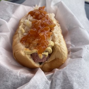 Mellow Dogs - a hot dog covered in condiments - Hot Dogs Near Me - Durham, North Carolina