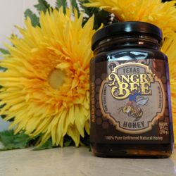 Angry Bee - A jar of our local raw honey. Happy bees make great honey. They get angry when we come to collect it, though.