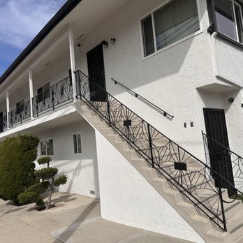 B&C Custom Fencing - Curved shapes on the staircase are larger than balcony and required special equipment for fabrication. - Fences & Gates Near Me B&C Custom Fencing - Curved shapes on the staircase are larger than balcony and required special equipment for fabrication. - Fences & Gates Near Me