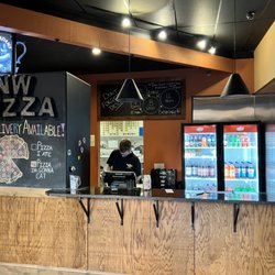 Northwest Pizza Company - Take Out Only joint -  store front with good seating to wait in.
