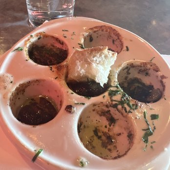 Maximilien - Escargot dipped with the baguette - French Near Me - Seattle, Washington Maximilien - Escargot dipped with the baguette - French Near Me - Seattle, Washington
