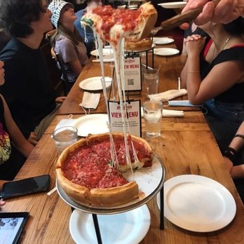 Giordano's - Cheese pull at it's best - Pizza Near Me - Chicago, Illinois Giordano's - Cheese pull at it's best - Pizza Near Me - Chicago, Illinois