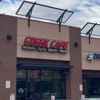Greek Cafe - a car parked in front of the restaurant - Greek Near Me - Colorado Springs, Colorado Greek Cafe - a car parked in front of the restaurant - Greek Near Me - Colorado Springs, Colorado