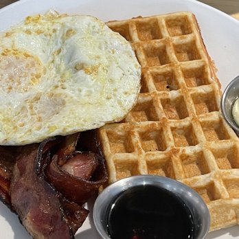 Sibling by Pushkin's - Waffle breakfast with eggs over medium and bacon - New American Near Me - Sacramento, California Sibling by Pushkin's - Waffle breakfast with eggs over medium and bacon - New American Near Me - Sacramento, California